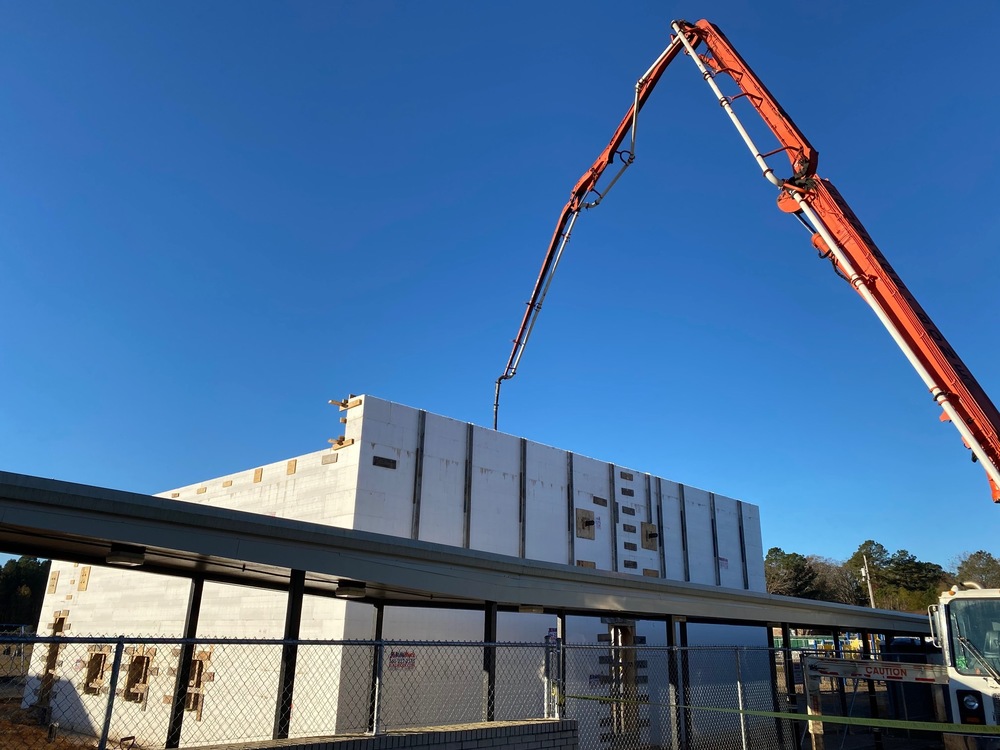 Concrete being poured into the building frame of Gandy's new "Safe Building".