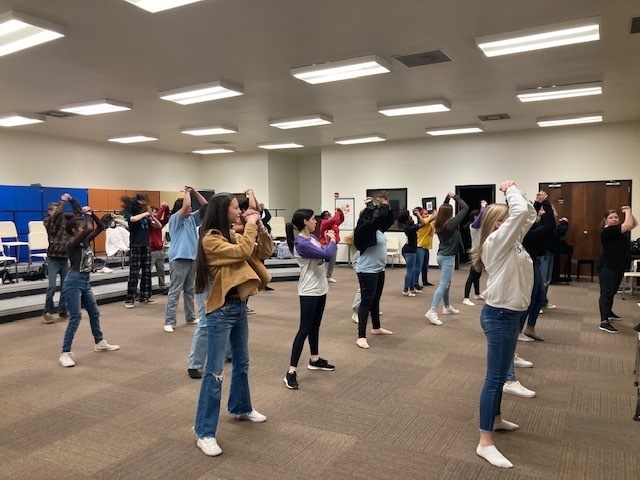 Choir students practicing for this year's Choir Happening.