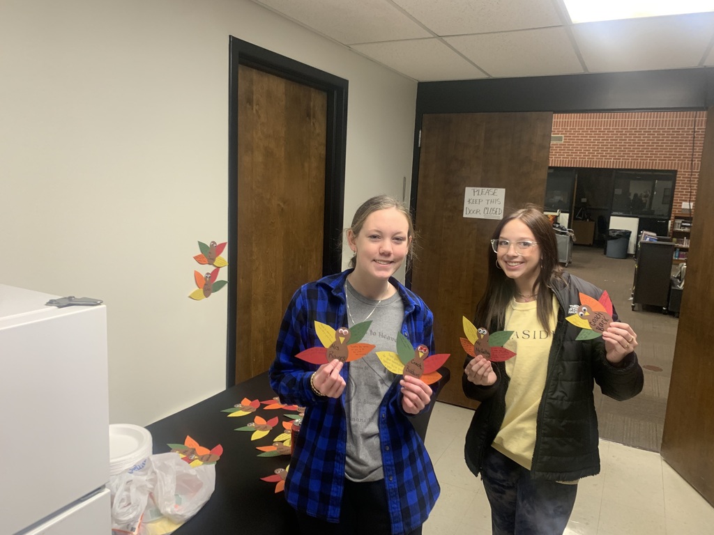 Students displaying "thankful turkeys" honoring our teachers.